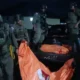 ersonel gabungan Satgas Operasi Damai Cartenz dan Polres Yahukimo mengevakuasi jenazah anggota KKB Kodap XVI Yahukimo di Dekai.